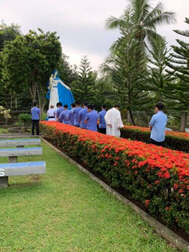 Vocationist Religious pray by the Statue of Our lady of Divine Vocations in Davao, Philippines