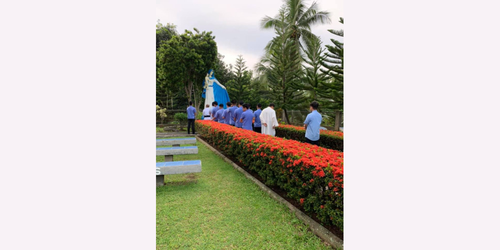 Vocationist Religious pray by the Statue of Our lady of Divine Vocations in Davao, Philippines