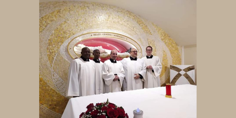 Vocationist young religious at the crypt of fr. Justin in Pianura, Jan 18, 2021. Giovani religiosi Vocazionisti presso la tomba di don Giustino (da sinistra Guy Simplice, Joseph, Vincenzo,Vito e Filippo).18 Gennaio 2021